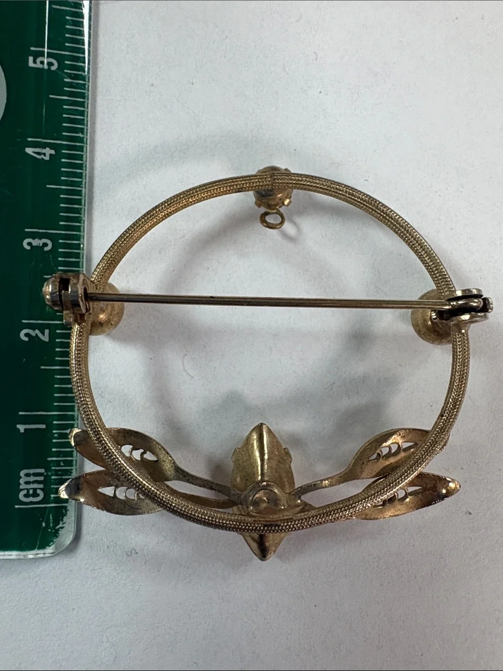 Gold-Tone Floral Circle Brooch with Marquise Opalescent Stone